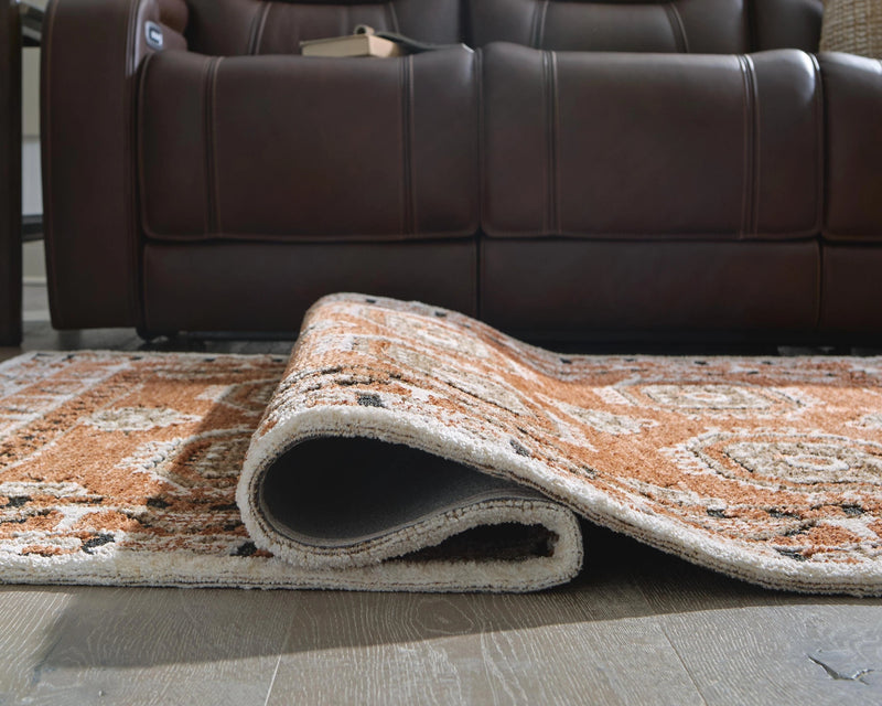 Qaabiz Area Rug