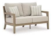 Hallow Creek Outdoor Loveseat with Cushion - Theo's Factory Direct Mattress & Furniture (Columbus, OH)