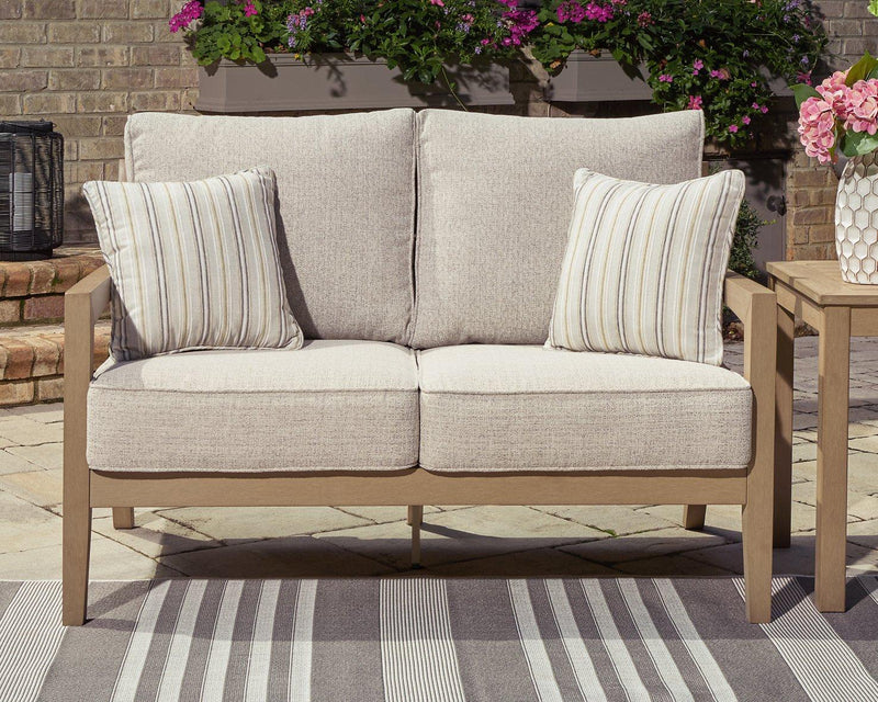 Hallow Creek Outdoor Loveseat with Cushion - Theo's Factory Direct Mattress & Furniture (Columbus, OH)