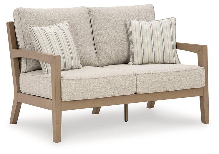 Hallow Creek Outdoor Loveseat with Cushion - Theo's Factory Direct Mattress & Furniture (Columbus, OH)