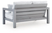 Hurley Park Outdoor Loveseat with Cushion - Theo's Factory Direct Mattress & Furniture (Columbus, OH)