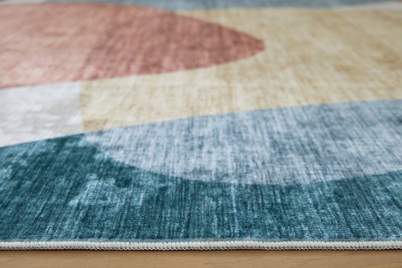 Chanleigh Washable 5' x 7' Area Rug - Theo's Factory Direct Mattress & Furniture (Columbus, OH)