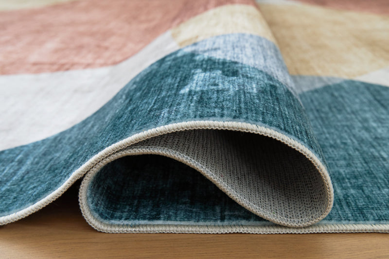 Chanleigh Washable 7'6" x 9'6" Area Rug - Theo's Factory Direct Mattress & Furniture (Columbus, OH)